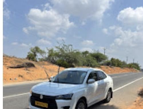 Bevin Transports sedan taxi on the Tiruchendur coastal road